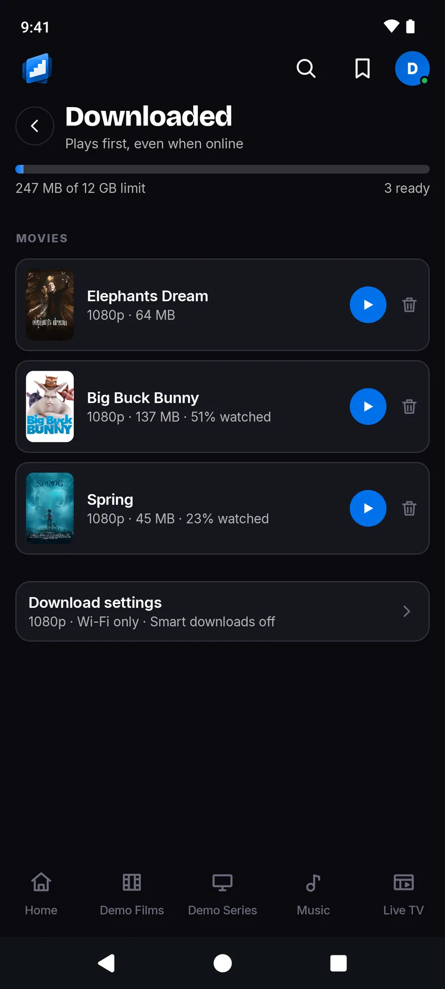 The Downloaded screen with a storage meter and three films ready to play: Elephants Dream, Big Buck Bunny and Spring.