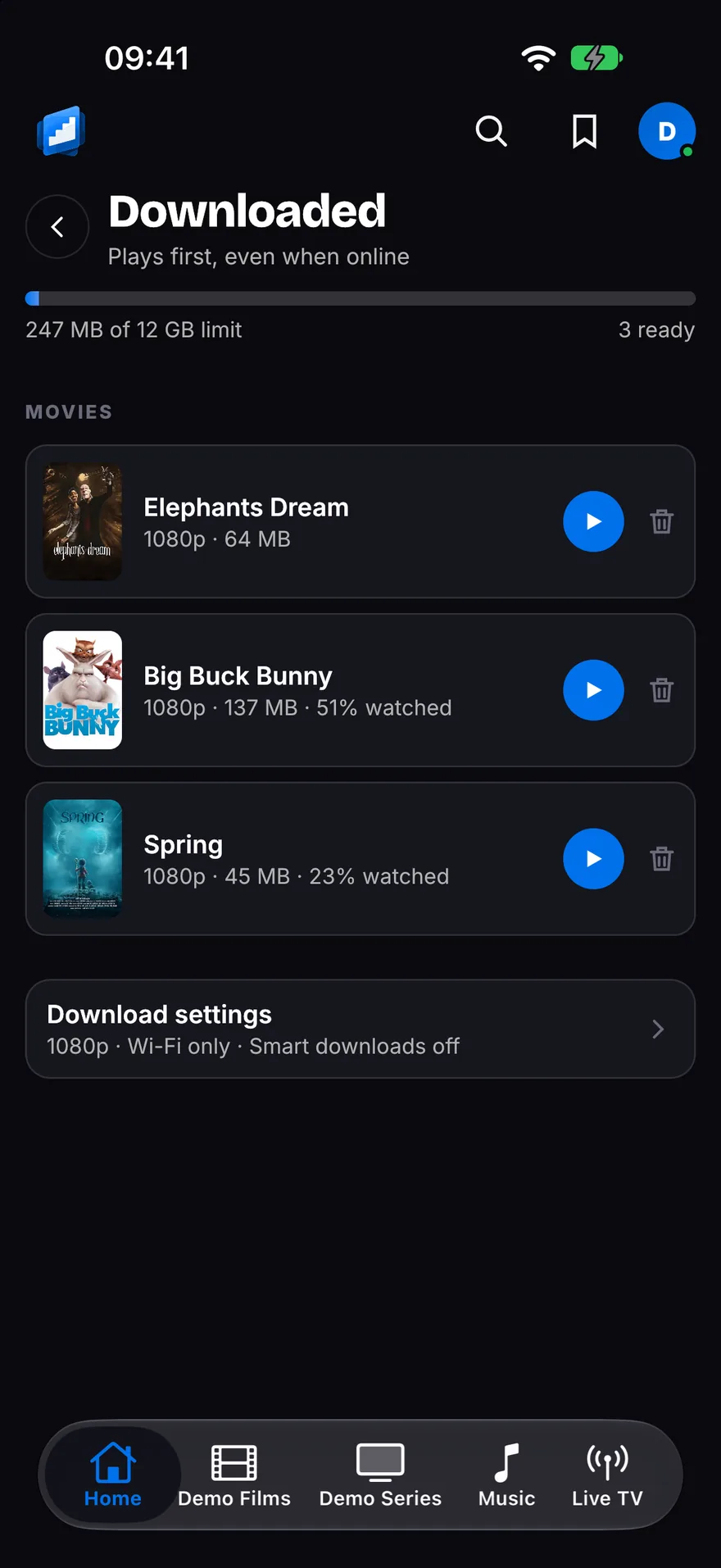 The Downloaded screen with a storage meter and three films ready to play: Elephants Dream, Big Buck Bunny and Spring.